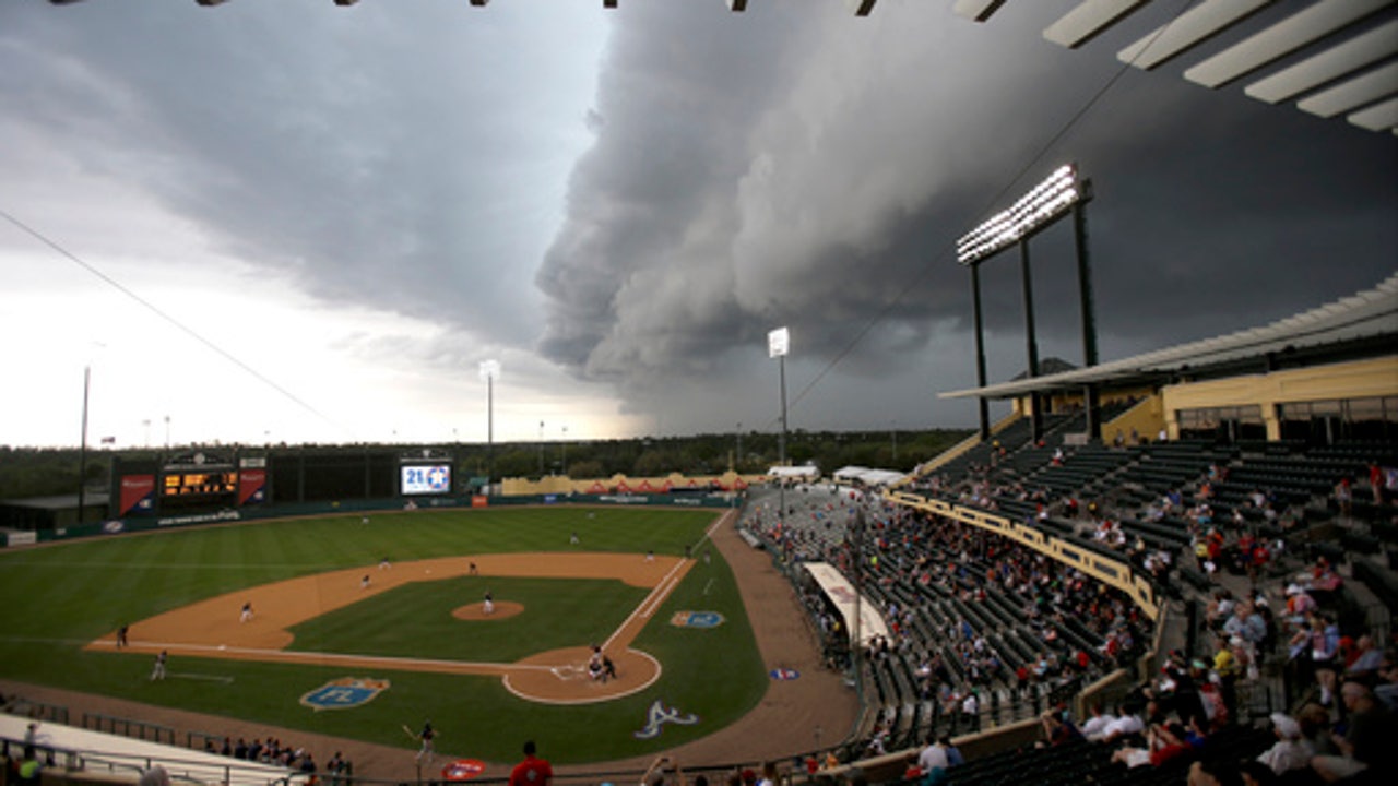 APNewsBreak: Spring training to be shortened slightly in '18